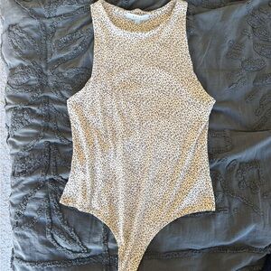 Gaze Cream and Black Animal Print Bodysuit